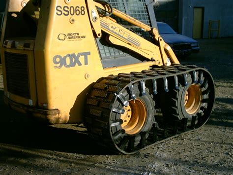 rubber over the tire skid steer tracks|bobcat 753 over tire tracks.